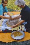 Aunties Yianoula and Petroula Grinding Wheat