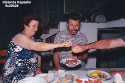 Yiorgos the Farmer and His Wife, Anna.  Enjoying meze at home in Crete.