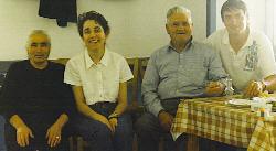 At Zambia's Kafeneo in Pano Elounda, Crete.  Zambia (left) and Company